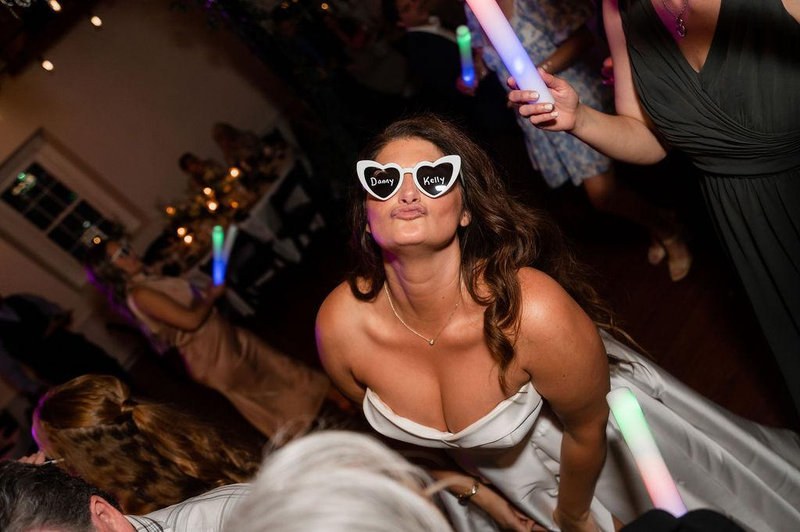 Bride celebrating on the dance floor