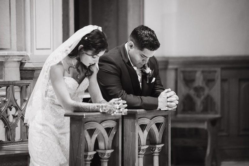 Couple together during a church ceremony