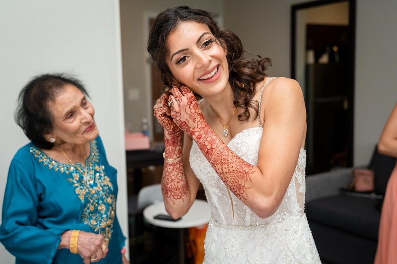 Bride getting ready with a loved one