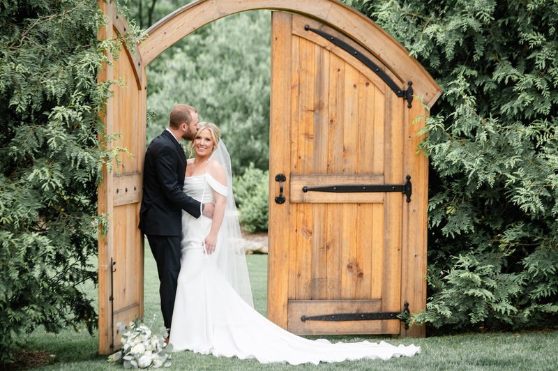 Couple by a garden doorway