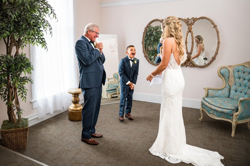 First look with family before the ceremony