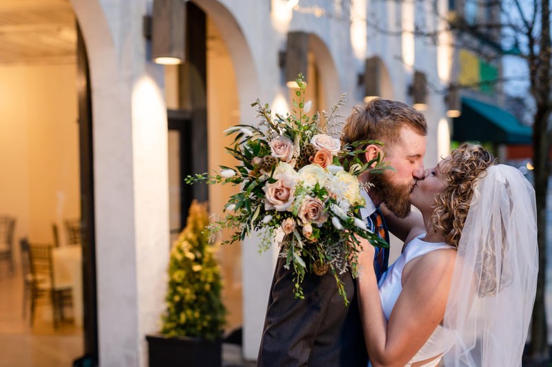 Couple embracing inside the ceremony venue