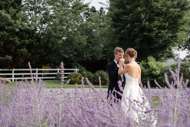 Couple together in a field of purple flowers