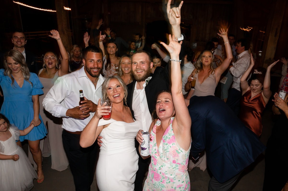 Guests celebrating together on the dance floor
