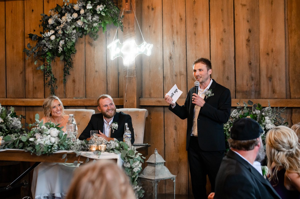 Reception speech with the newlyweds listening